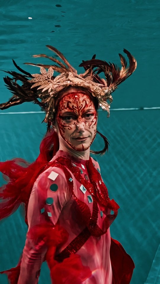 The Carnival Party has started! World freediving champion Alessia Zecchini kicked off the celebrations in Y-40 The Deep Joy! In the water of the world's deepest thermal pool, the Queen of the Abyss, recalled the Venetian Carnival with her golden headdress and Chinese New Year with her long red train reminiscent of the traditional dragon.Video by Matt Evans & Umberto Aiti, Deep Altitudes.Styling and bodypainting by Lela Perez Safety diver: Helena Bourdillon