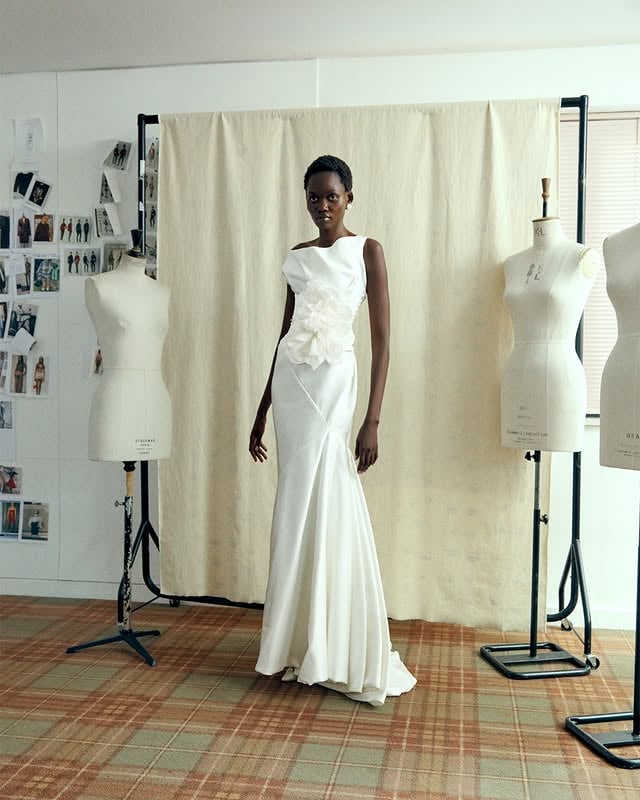Inspired by the Amber dress, which was first revealed on the red carpet, the Vita gown evokes timeless allure. The non-corseted design features asymmetric seams and bias-cut drapery, that sweeps delicately across the bust and contours the hips, shaping an elegant fishtail silhouette.#VWBridal #WestwoodBridal by @viviennewestwood