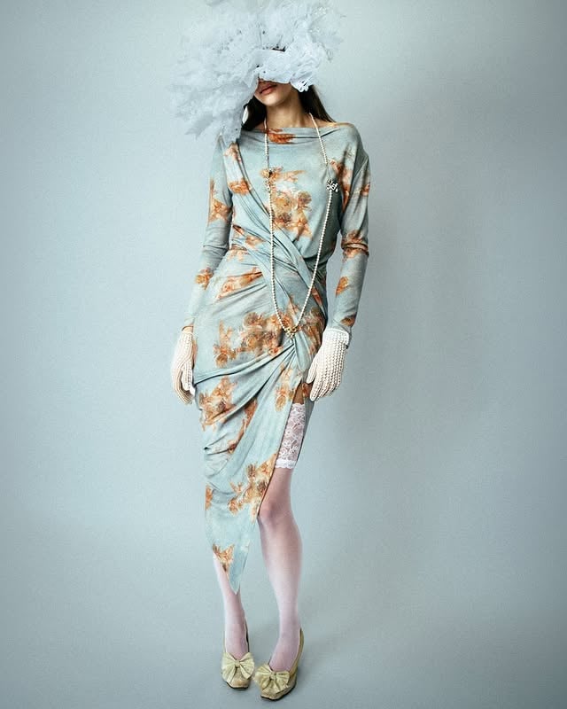 Our Spring Cherubs capsule echoes a continued appreciation for the Rococo period, with the ethereal print featured across sharp shirting silhouettes, alongside soft luxurious jersey styles.#SpringCherubsSpring, from a series of the Four Seasons by Boucher, François (1703-70) Chateau de Fontainebleau,Seine-et-Marne, France /Bridgeman ImagesPhotographer: @fruit__looopMake up Artist: @machiko_yanoHair Stylist: @tommystayton by @viviennewestwood
