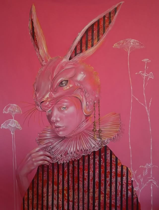 ''Ethereal. Haunting. Unmistakably cinematic. @esrayildirim.art, one of the most refined and internationally compelling female voices emerging from contemporary Turkish art. A distinctive presence in contemporary figurative painting, Yıldırım’s works exist between cinematic surrealism, feminine mythology, and psychological symbolism constructing haunting visual worlds that feel both deeply intimate and universally resonant. Through recurring rabbit figures and dreamlike compositions, the artist explores fragility, ritual, identity, and the quiet tension between innocence and unease. Both intimate and unsettling, her works blur the boundaries between dream and reality creating a visual universe that feels timeless, deeply emotional, and unmistakably her own. One of the most compelling emerging voices in contemporary figurative painting.' - Esra Yıldırım @esrayildirim.art by @beautifulbizarremagazine