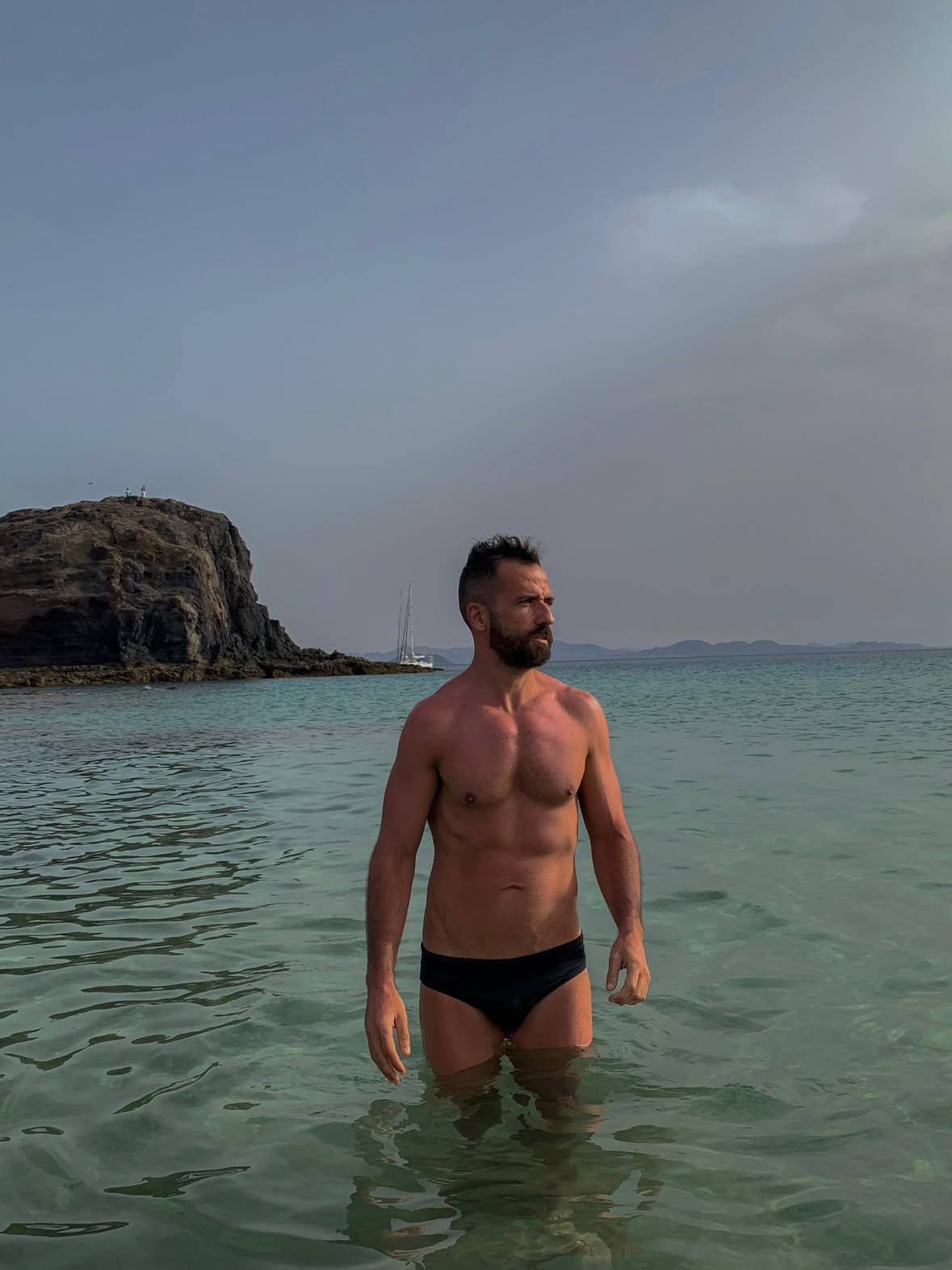 [ Nothing but the sea … ] #black 
.
.
.
.
.
. #sunbathing #pride #speedo #calm