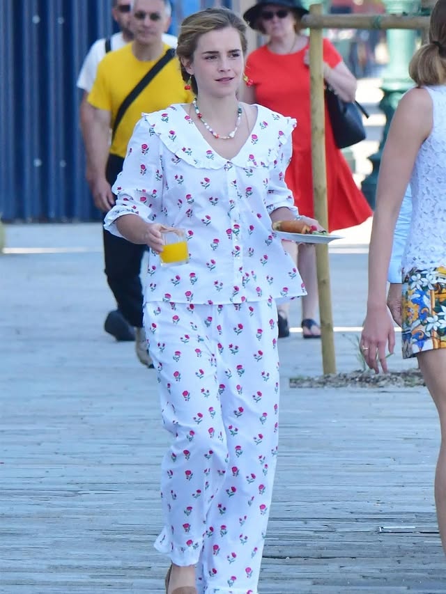 We've all had those days where you simply cannot fathom the idea of changing out of your pajamas to leave the house. Out and about in Venice, Emma Watson did just that—with a breakfast plate and a glass of OJ at the ready. Tap the link in our bio to discover how Watson knows there's nothing snoozy about pajama dressing, especially when you're sporting sustainable fashions.